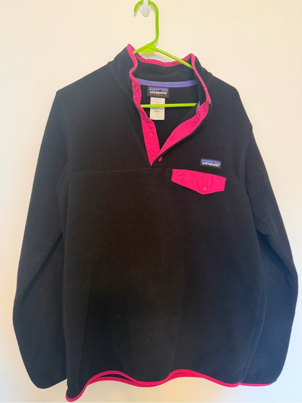 Patagonia women’s Black Synchilla Fleece with Pink Trim